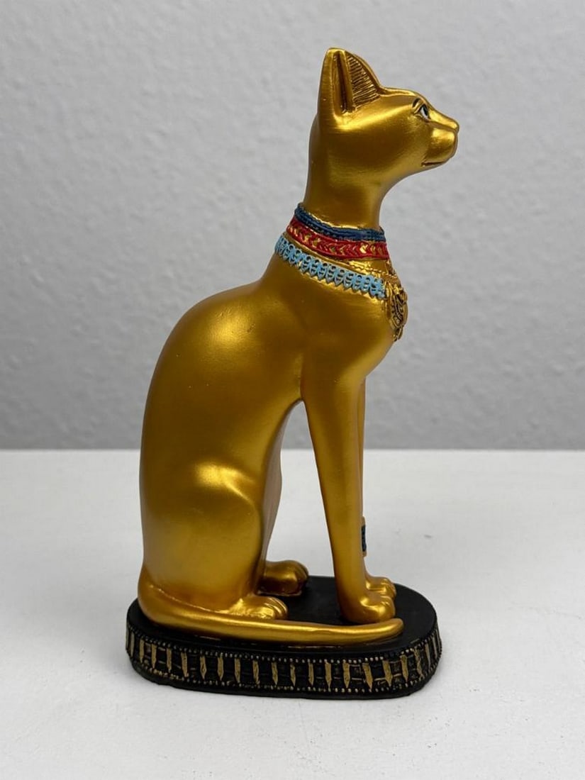 Bastet Egyptian Cat Goddess Sculpture: Bastet Egyptian Cat Goddess Sculpture Pay homage to the revered feline deity of ancient Egypt with this elegant Bastet statue. Representing protection, fertility, and grace, Bastet is depicted in