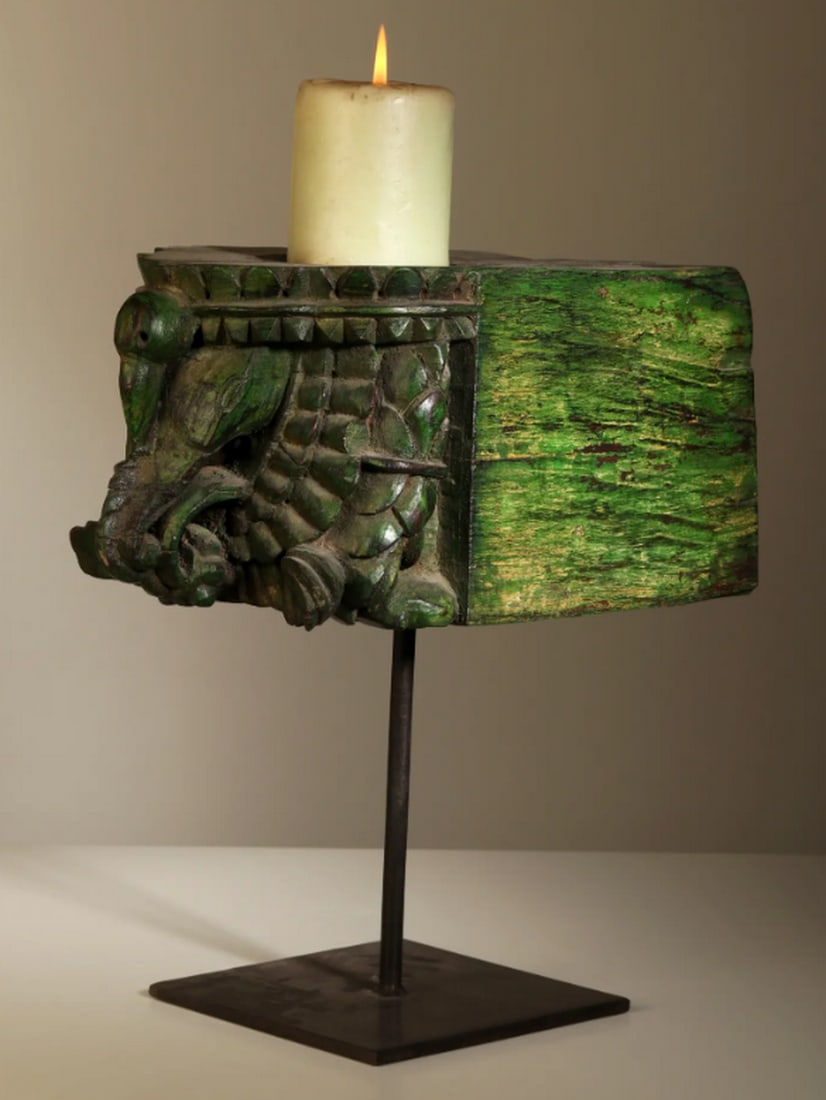 Wood Carved Elephant Design Candle Holder on Iron Stand – 13": Wood Carved Elephant Design Candle Holder on Iron Stand – 13" A 13-inch candle holder featuring a wood-carved elephant design mounted on a sturdy iron stand. The combination of natural wood