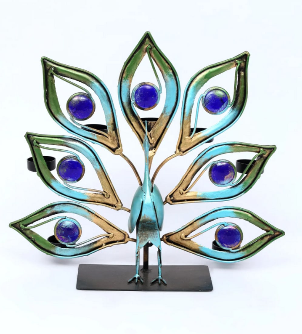 16" Decorative Peacock with Tealight Candle Holders: 16" Decorative Peacock with Tealight Candle Holders Handmade from iron, this decorative piece features a peacock form designed to hold tealight candles. The structure combines ornamental