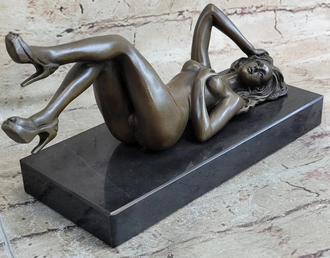 Signed Original Nude Woman Laying On Back Bronze Sculpture - 5" x 10": Signed Original Nude Woman Laying On Back Bronze Sculpture - 5" x 10" This sculpture of a nude woman will go beautifully put in any room of the house or as a gift. She lays on her back as she 