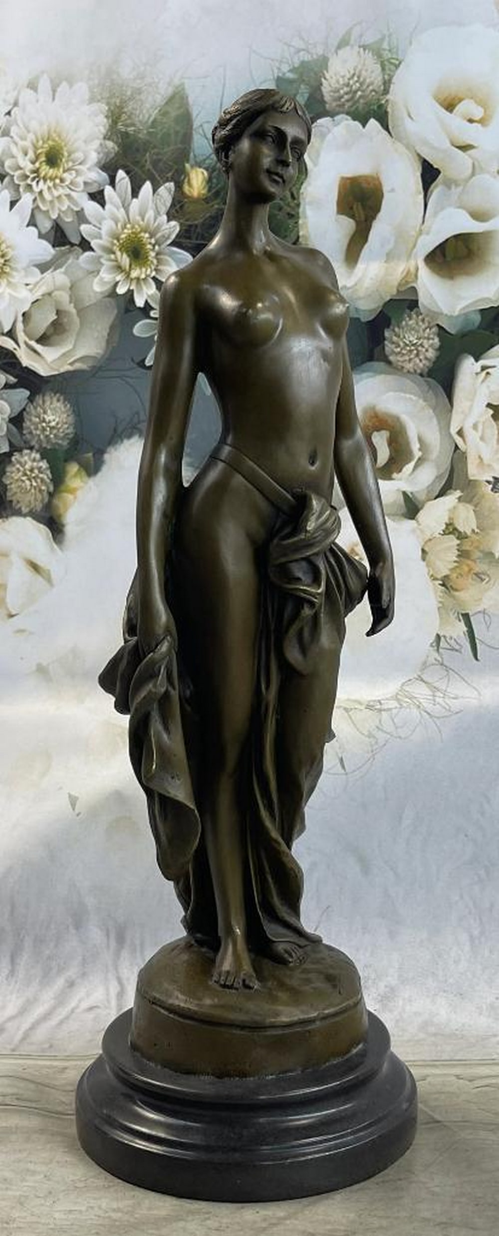 A. Brutt Inspired Nude Bronze Woman Bronze Sculpture - 17" x 6": A. Brutt Inspired Nude Bronze Woman Bronze Sculpture - 17" x 6" Introducing a captivating bronze statue that exudes allure, pride, and unwavering confidence. This exquisite piece celebrates th