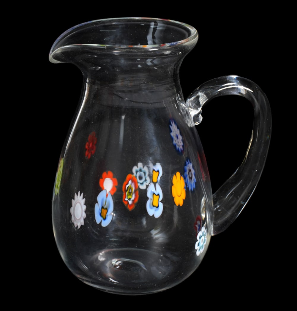 Sorrento Blown Glass Pitcher Stained Murano Glass: Sorrento Blown Glass Pitcher Stained Murano Glass This carafe is crafted using the glassblowing technique, featuring murrina decoration and vibrant colors achieved with macete—small glass pieces. Id