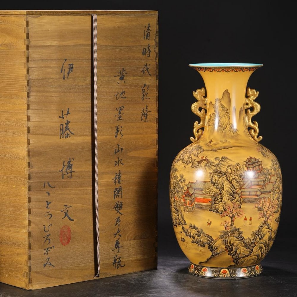 Inspired Qianlong Yellow Ground Dragon-Handled Landscape Vase: Inspired Qianlong Yellow Ground Dragon-Handled Landscape Vase This magnificent vase draws inspiration from the Qing Dynasty’s illustrious Qianlong period. Set against a radiant yellow ground, a colo