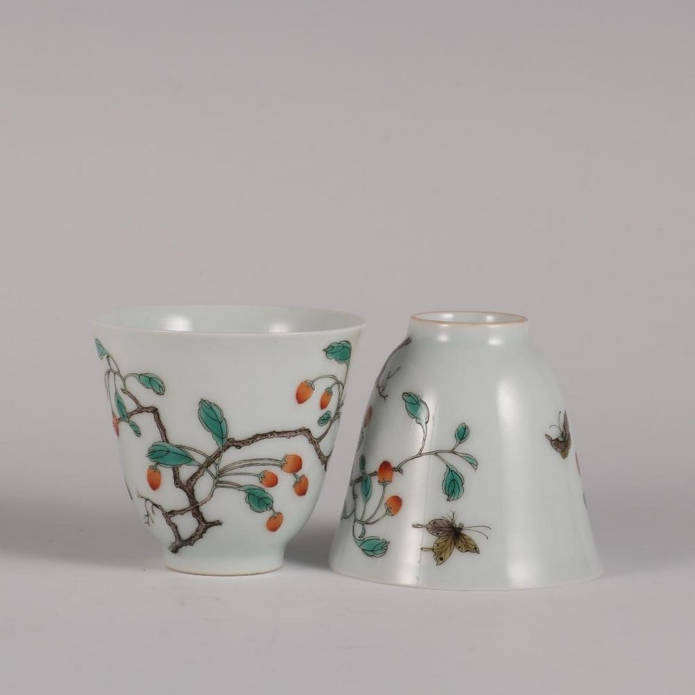 Qing Yongzheng Inspired Famille Rose Wolfberry Bell Cup Pair: Qing Yongzheng Inspired Famille Rose Wolfberry Bell Cup Pair This elegant pair of bell-shaped cups draws inspiration from the refined artistry of the Qing Dynasty during the Yongzheng reign. Adorned w