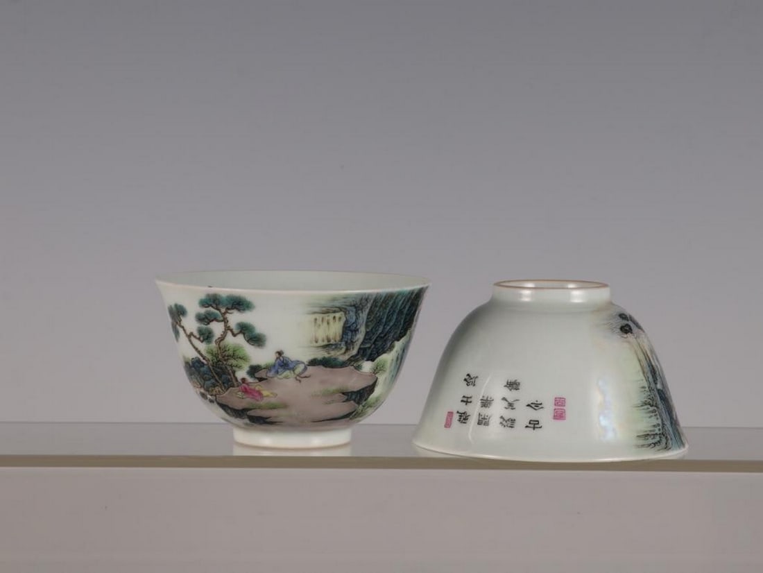 Pair of Qing Dynasty Yongzheng Inspired Famille Rose Landscape and Figure Story Cups: Pair of Qing Dynasty Yongzheng Inspired Famille Rose Landscape and Figure Story Cups An inspired pair of porcelain cups in the style of the Yongzheng period (1723–1735) of the Qing Dynasty, finely d