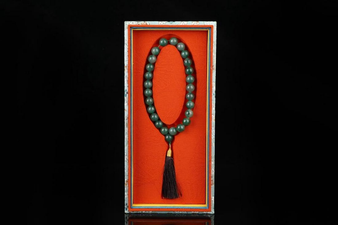 Elegant Jade Bracelet: Elegant Jade Bracelet A finely crafted jade bracelet, showcasing smooth texture and rich color typical of quality jade. With a diameter of 1.2 cm and weighing 90 grams, this bracelet combines