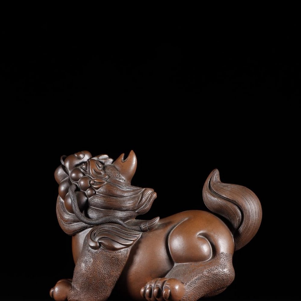 Inspired Zisha "Auspicious Beast" Teapot: Zisha Inspired "Auspicious Beast" Teapot A remarkable Zisha (Yixing purple clay) teapot, inspired to the celebrated Qing Dynasty potter Chen Mingyuan, renowned for his naturalistic and imagina