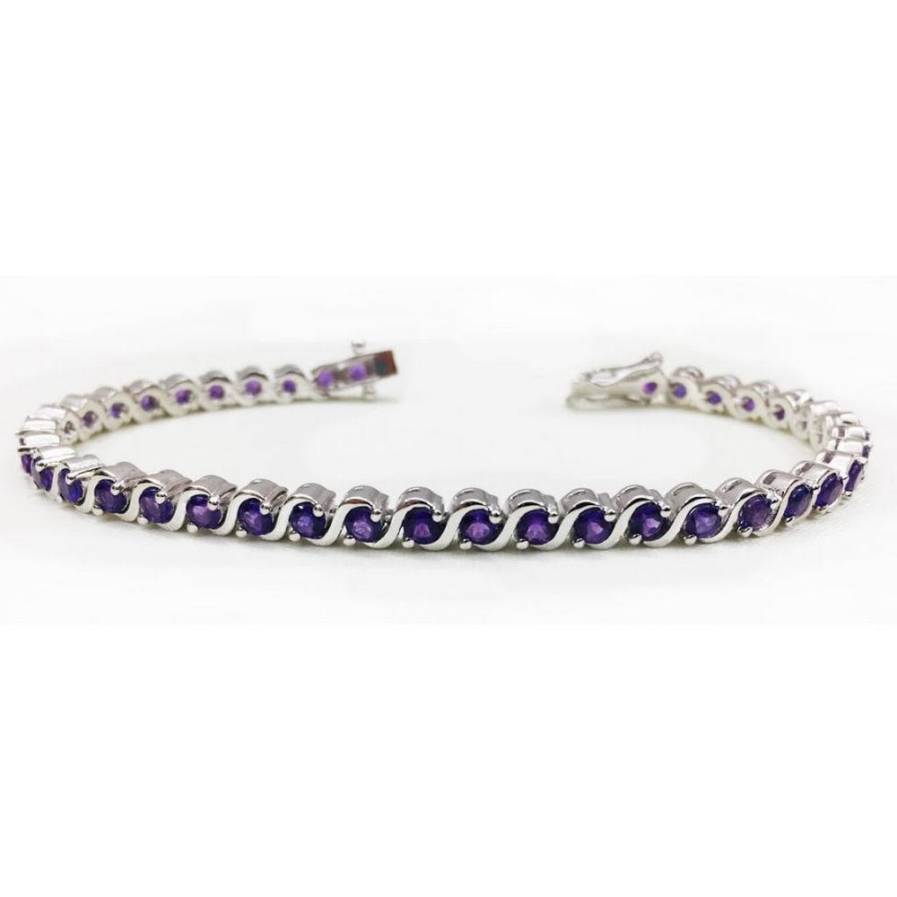 925 Sterling Silver Bracelet Studded with Amethyst Round Faceted Gems: 925 Sterling Silver Bracelet Studded with Amethyst Round Faceted Gems Amethyst is a natural tranquilizer, it relieves stress and strain, soothes irritability, balances mood swings, dispels anger,