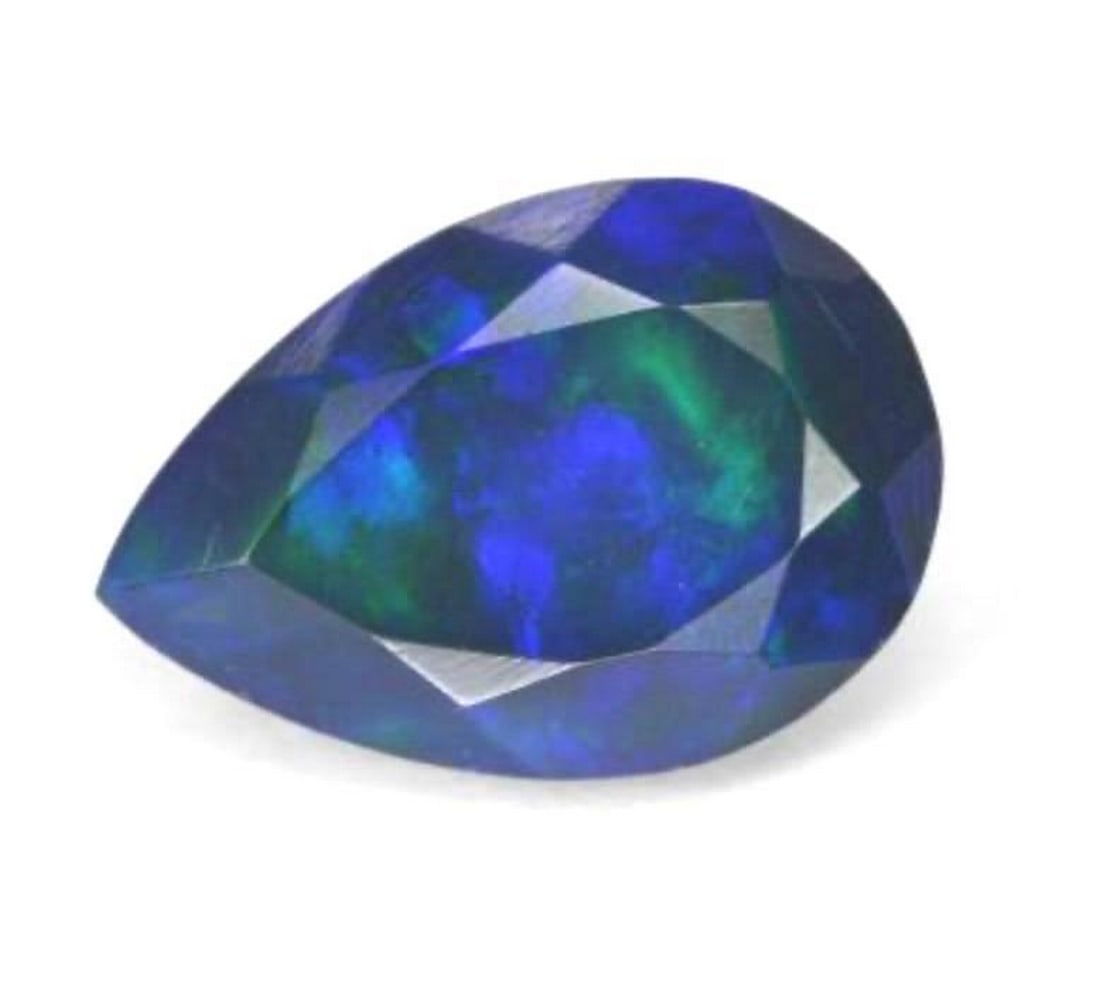 1.2ct Year of the Snake Gemstone: 1.2ct Year of the Snake Gemstone Size: 10.25 x 7.02 x 4.75 mm Type: Pear Facet Opal Colour: Multicolour Clarity: Translucent Treatment: Smoked Origin: Australia Mohs Hardness: 5.5-6.5