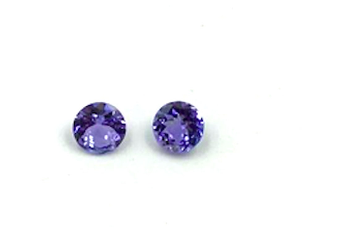 Lot Of 2 Round Cut Tanzanite Gemstone 1.24 Carat Total Weight: Lot Of 2 Round Cut Tanzanite Gemstone 1.24 Carat Total Weight Tanzanite is a rare and precious gemstone, which has been coined a 'geographical phenomenon' because of the unusual formation of