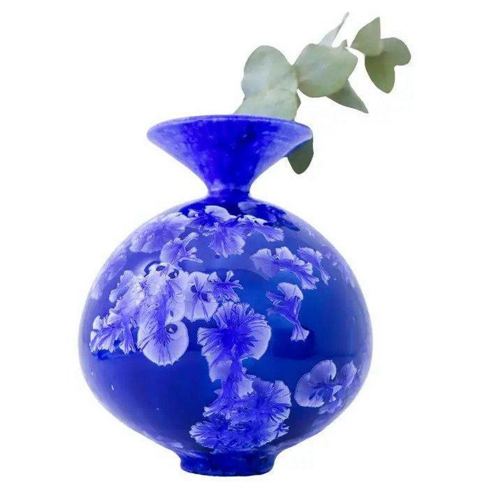 Contemporary Artistry: Isak Isaksson's Crystalline Glaze on Blue Ceramic Vase: A striking blue vase adorned with a mesmerizing crystalline glaze, crafted by the talented Isak Isaksson in Sweden. Standing at a height of 17.5 cm (7 inches) and boasting a diameter of approximately