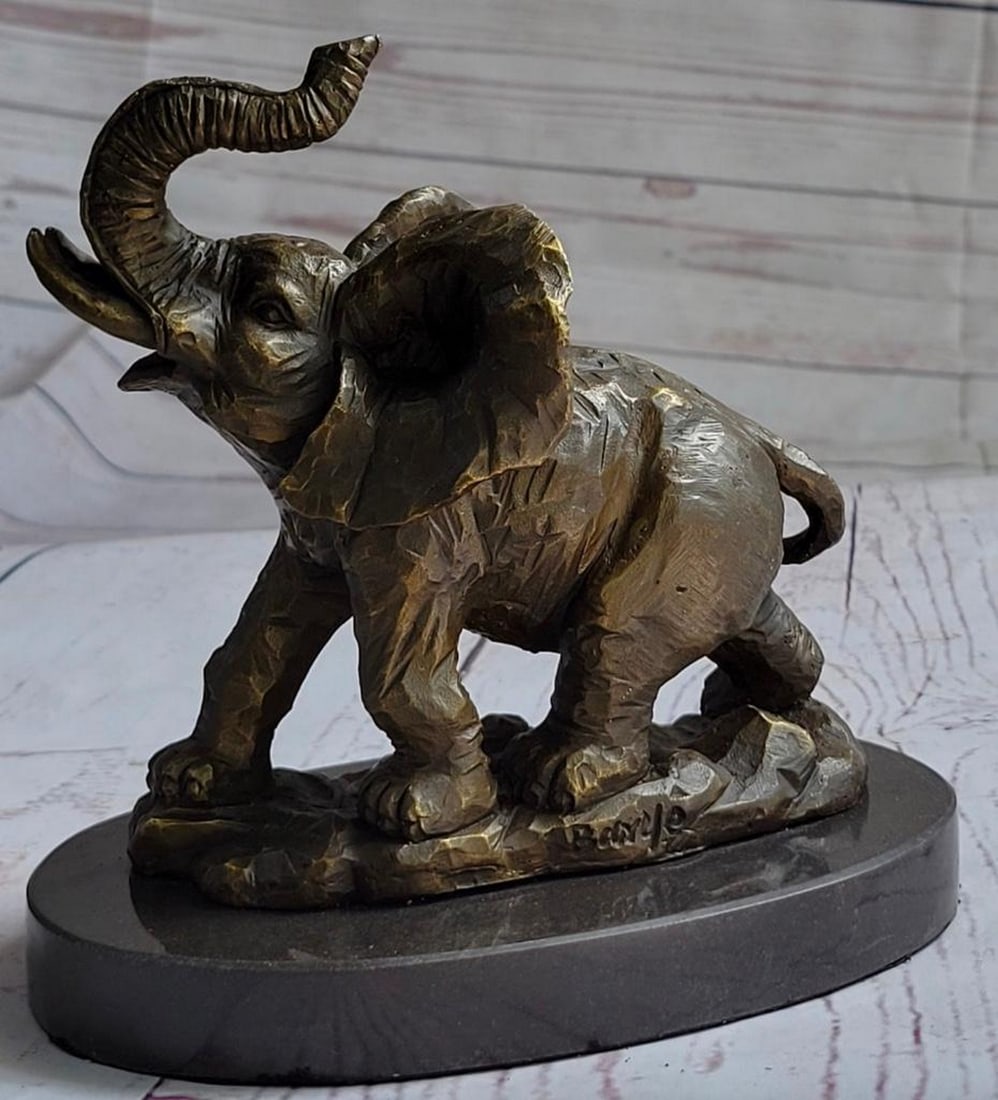 The Trumpeting Elephant Bronze Sculpture: The Trumpeting Elephant Bronze Sculpture He walks proudly through the dusty plains lifting his trunk up towards the sky while letting out a loud elephants trumpet to let his presence be known. The tex