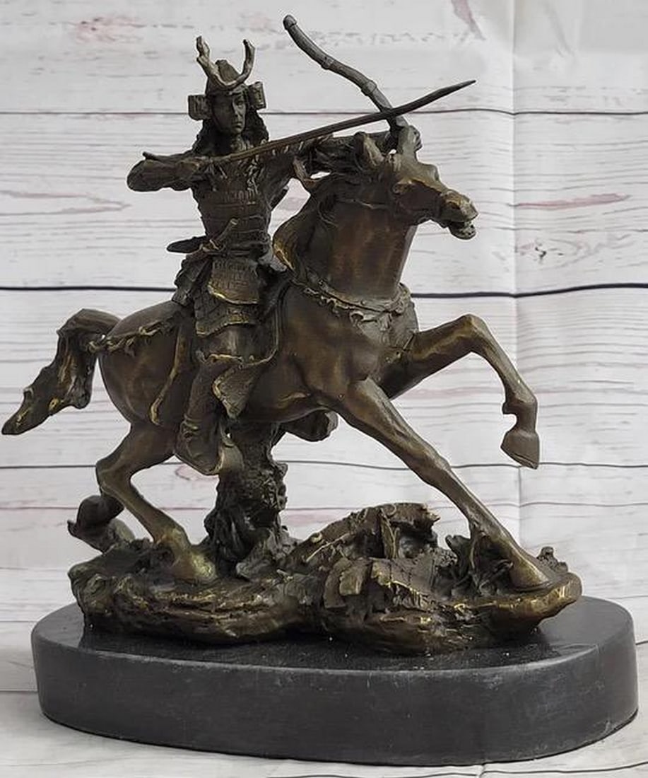 Samurai Wielding Bow on Horse Back Bronze Statue - 9" x 9": Samurai Wielding Bow on Horse Back Bronze Statue - 9" x 9" Introducing an exquisite bronze sculpture that radiates sophistication, ideal for enhancing any art enthusiast's space. This rare