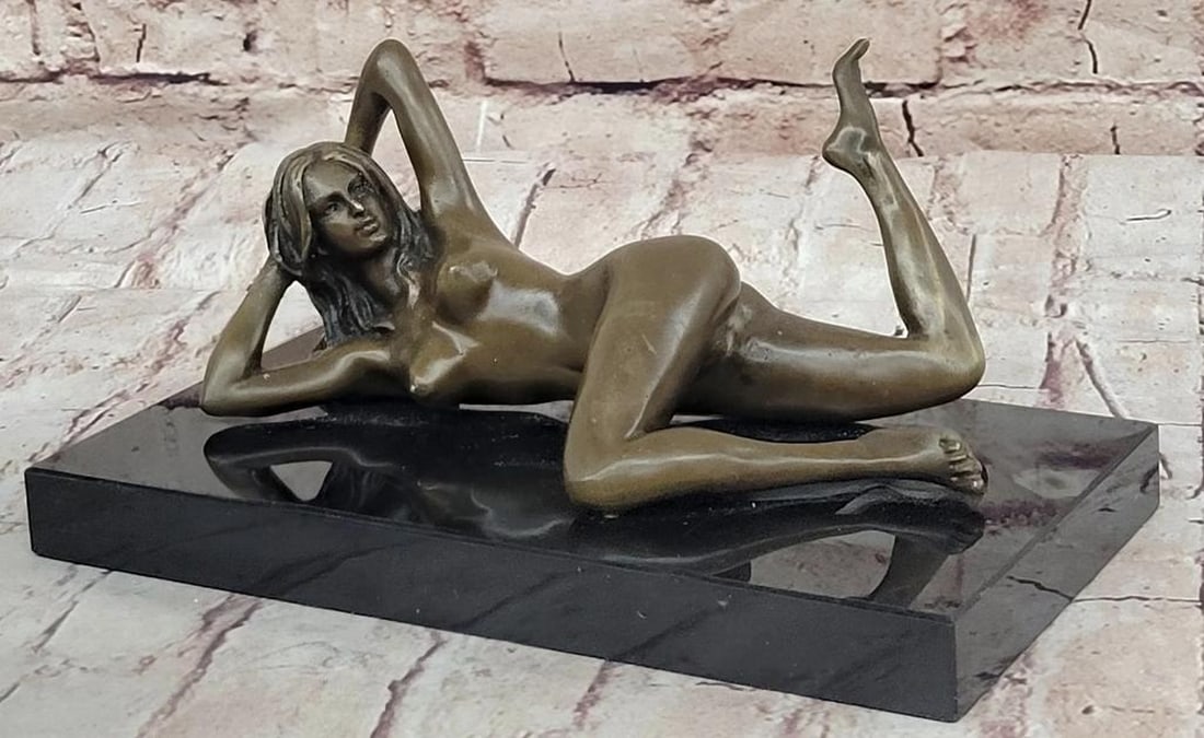 The Nude Temptress Original Bronze Sculpture by Mavchi - 3.5" x 8": The Nude Temptress Original Bronze Sculpture by Mavchi - 3.5" x 8" This captivating bronze sculpture by Mavchi portrays a nude temptress lying gracefully on the floor, her body arching in a mo