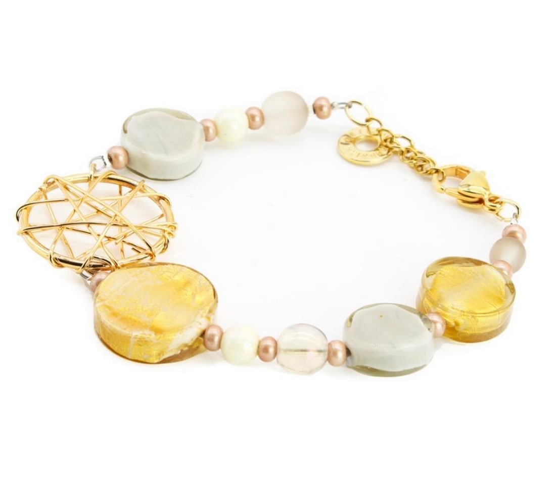 Bracelet With Gold Leaf Murano Glass: Bracelet With Gold Leaf Murano Glass This unique bracelet is the perfect accessory with the gold accents and beads. Dimensions: 8.3"L x 1.6"W x 0.4"H View Photos For Further Details.