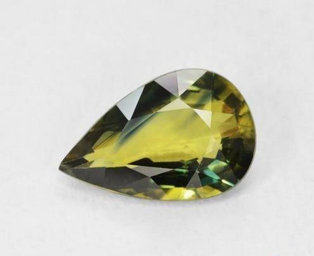 2.11ct Pear Cut Mutlicolor Sapphire: 2.11ct Pear Cut Mutlicolor Sapphire Specifications: Type: Sapphire Weight: 2.11ct Size:10 X 7mm Shape: Pear Facet Color: Multicolor Clarity: VVS-VS <