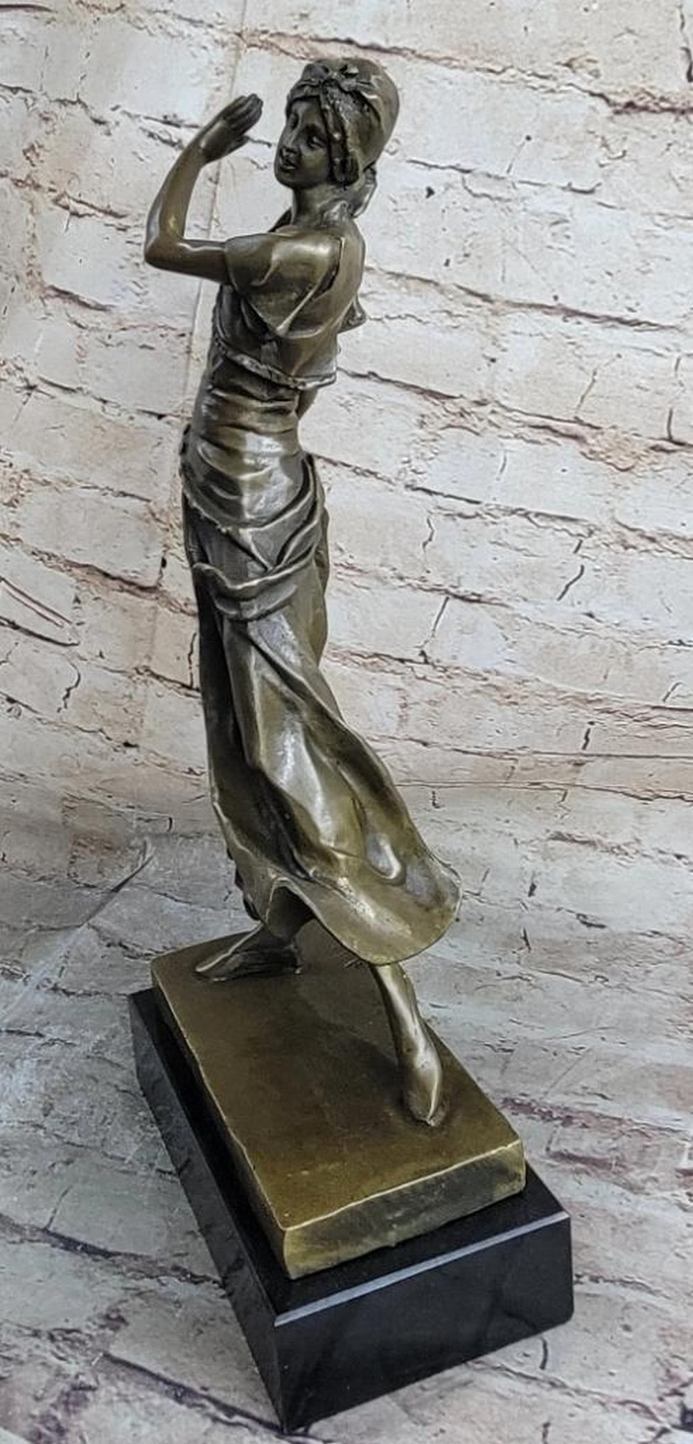 Bronze ''Gory Gypsy Dancer'' Sculpture on Marble Base - 15lbs: Bronze " Gory Gypsy Dancer" Sculpture on Marble Base - 15lbs This beautiful sculpture of a Indian lady dancing is amazing in details from her dress to her face. She wears this long one piece sho