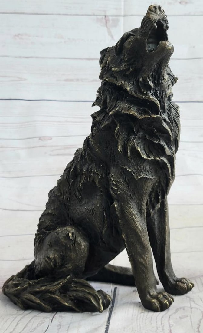 Barye Inspired Wolf Howling At Moon Bronze Sculpture - 11'' x 12'': Barye Inspired Wolf Howling At Moon Bronze Sculpture - 11" x 12" Presenting an exquisite bronze sculpture, behold the commanding presence of a solitary wolf. With a dignified stance and its head