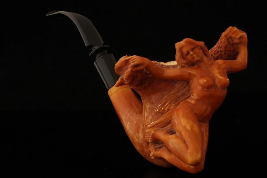 Scarf Dance Hand-Carved Meerschaum Pipe with Fitted Case: Scarf Dance Hand-Carved Meerschaum Pipe with Fitted Case This exquisite hand-carved meerschaum pipe features the elegant ''Scarf Dance'' design, showcasing intricate artistry and exceptional craftsman