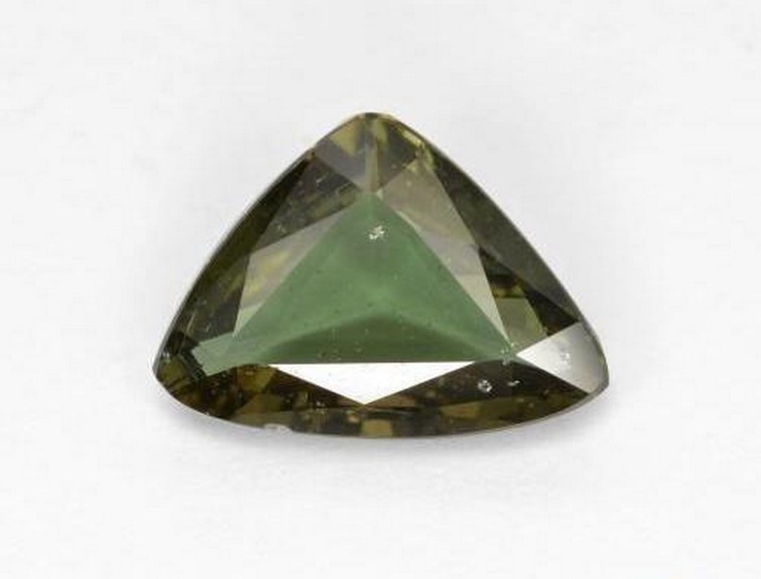 1.57 ct Natural Deep Earth Green Kornerupine, Trillion Facet, VS-SI, Sri Lanka: 1.57 ct Natural Deep Earth Green Kornerupine, Trillion Facet, VS-SI, Sri Lanka Natural Kornerupine gemstone weighing 1.57 carats, cut in a trillion facet with a deep earth green color. The gem measure