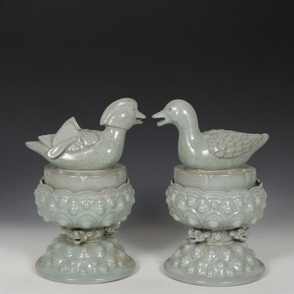 Pair of Ru Kiln Azure-Glazed Incense Burners: Pair of Ru Kiln Azure-Glazed Incense Burners This elegant pair of incense burners is crafted in the style of Song Dynasty Ru kiln wares, renowned for their subtle beauty and refined glazes. Each piece