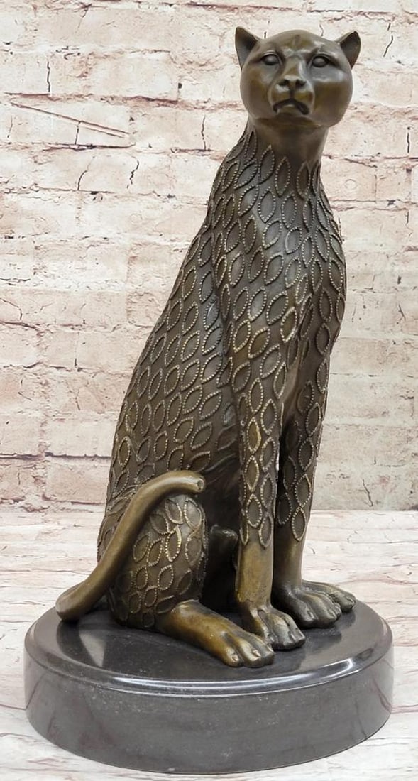 Graceful Cheetah Bronze Sculpture Inspired By Henry Moore - 13.5'' x 7.5'': Graceful Cheetah Bronze Sculpture Inspired By Henry Moore - 13.5" x 7.5" With grace and mesmerizing allure, this bronze cheetah gazes into the distance, commanding admiration and showcasing its 