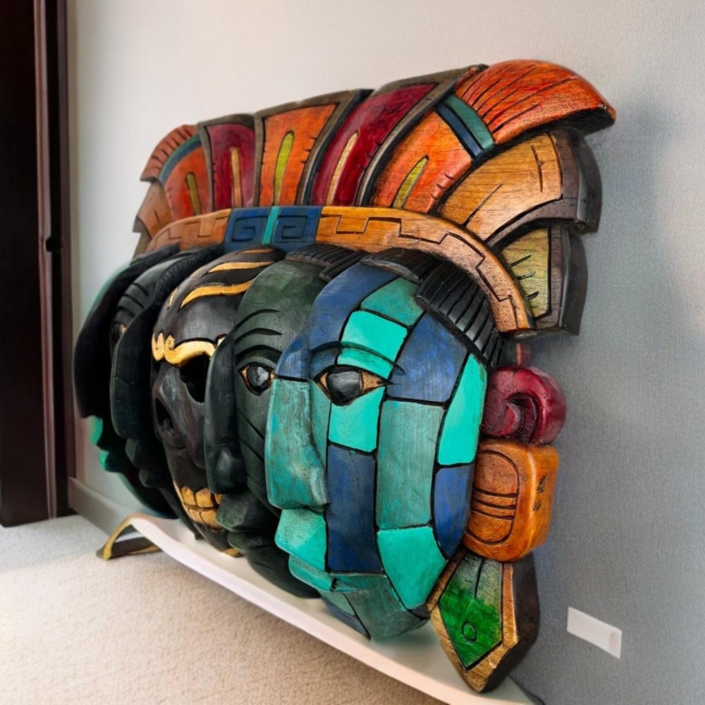 Mask of Death & Rebirth - Mayan Handcrafted Wall Art: Mask of Death & Rebirth - Mayan Handcrafted Wall Art This stunning Mayan mask, handcrafted by skilled artisans, symbolizes the continuous cycle of life, death, and rebirth. With three layered faces, e