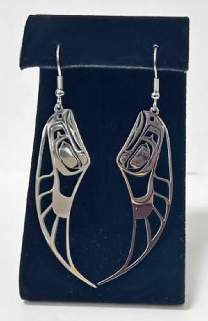 Wings of Freedom Earrings: Wings of Freedom Earrings The Wings of Freedom Earrings embody the strength and grace of the eagle in flight. Crafted from stainless steel, these earrings feature finely detailed wings that catch the