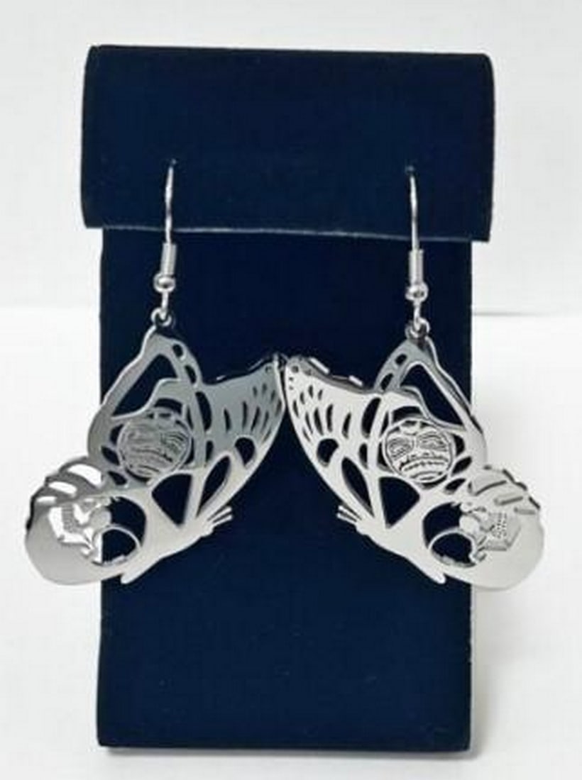 Celestial Wings Earrings: Celestial Wings Earrings The Celestial Wings Earrings combine the elegance of a butterfly with the brilliance of the sun. Crafted from durable stainless steel, these earrings feature intricate wings