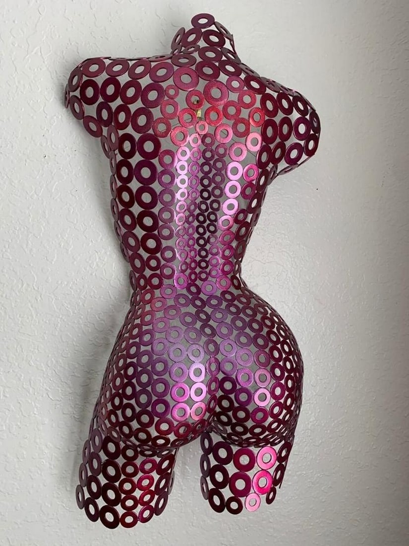 Candy Raspberry Torso Sculpture: Candy Raspberry Torso Sculpture This captivating female torso sculpture blends form and texture in a stunning display of artistry. Hand-formed and welded with expert precision, the fine-textured surfa