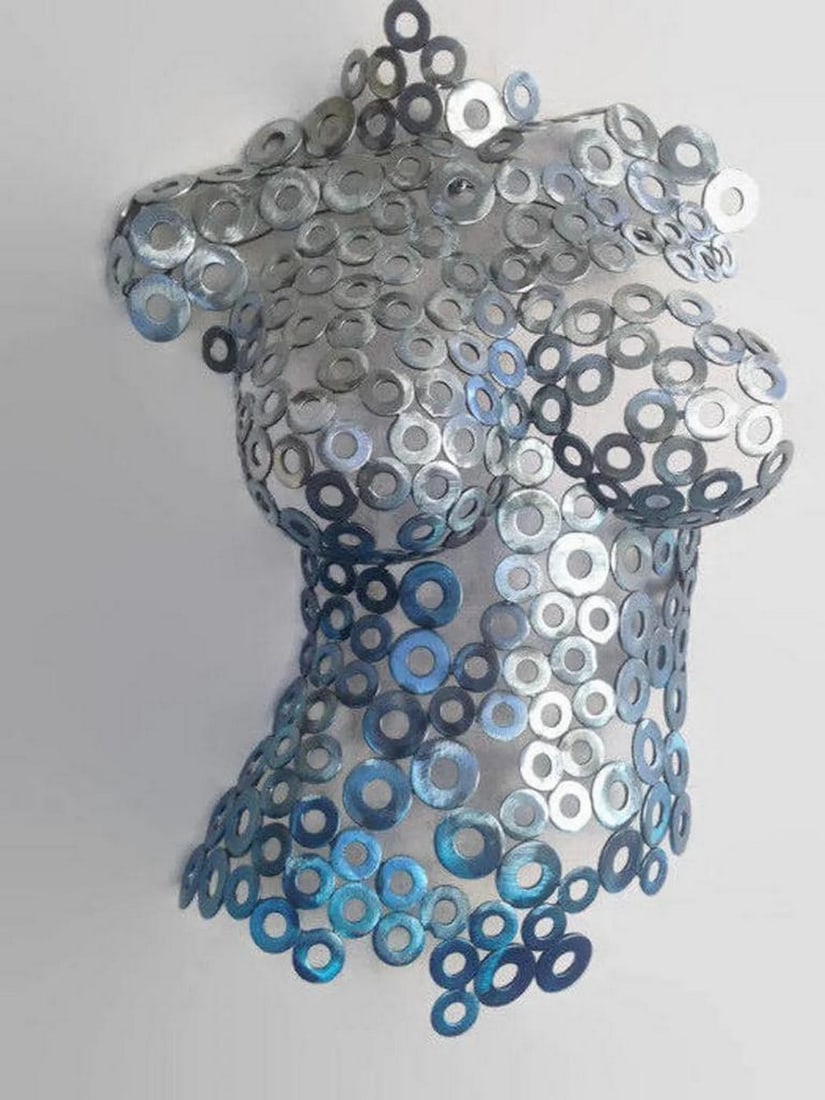 Blu Metal Torso Sculpture: Blu Metal Torso Sculpture Blu is a striking female torso sculpture that masterfully combines metalwork with sculptural form to create a timeless piece of art. Hand-formed and welded, every detail is