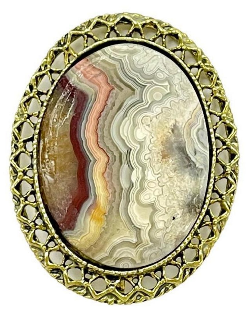 Golden Veins Agate Stone Elegance Brooch: Golden Veins Agate Stone Elegance Brooch Introducing the " Golden Veins Agate Stone Elegance Brooch" - a masterpiece that harmonizes the raw beauty of agate stone with the luxurious charm of gol