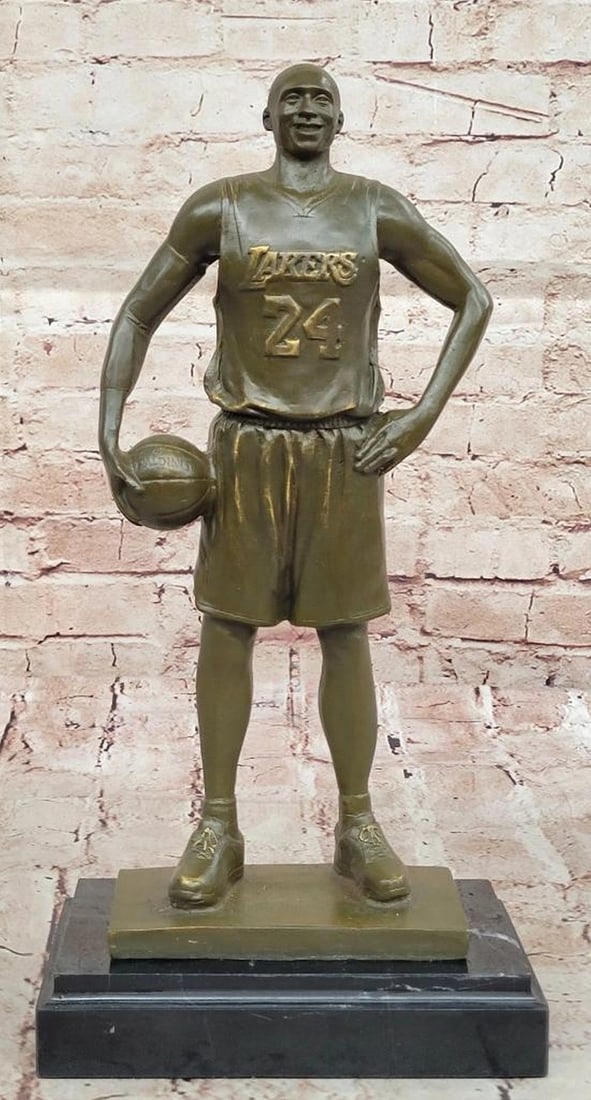 Kobe Bryant Bronze Statue Signed by Milo - 14.5'' x 7'': Kobe Bryant Bronze Statue Signed by Milo - 14.5" x 7" This Limited Edition Kobe Bryant Bronze Statue is a powerful tribute to one of the greatest basketball players of all time. Handcrafted usin