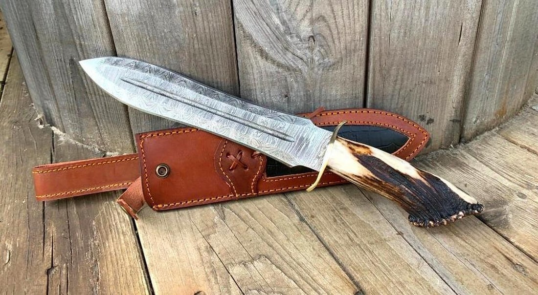 Of The Forest Brown Bone Handle Damascus Straight Blade Hunting Knife: Of The Forest Brown Bone Handle Damascus Straight Blade Hunting Knife This large hunting knife is a blend of rugged functionality and timeless craftsmanship, making it an essential tool for outdoor en