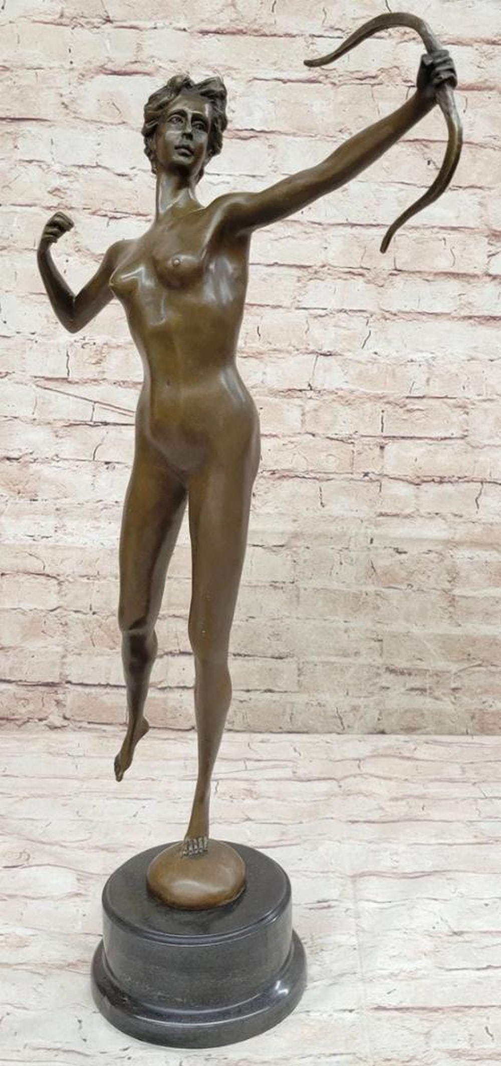 Nude Diana The Huntress' Signed Original Bronze Sculpture by Jean Patoue - 23'' x 13'': Nude Diana The Huntress Signed Original Bronze Sculpture by Jean Patoue - 23" x 13" Experience the harmonious blend of elegance and strength in the captivating " Nude Diana The Huntress" b