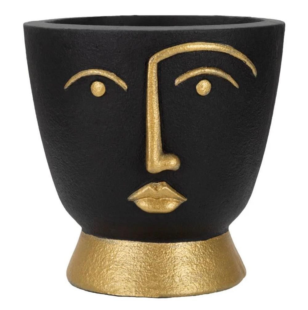 Modern Vase with Gold and Black Face Design: Modern Vase with Gold and Black Face Design Enhance your decor with this vase, showcasing a stylized face with sophisticated golden features influenced by primitive art. Discover Mauro Ferretti, the p