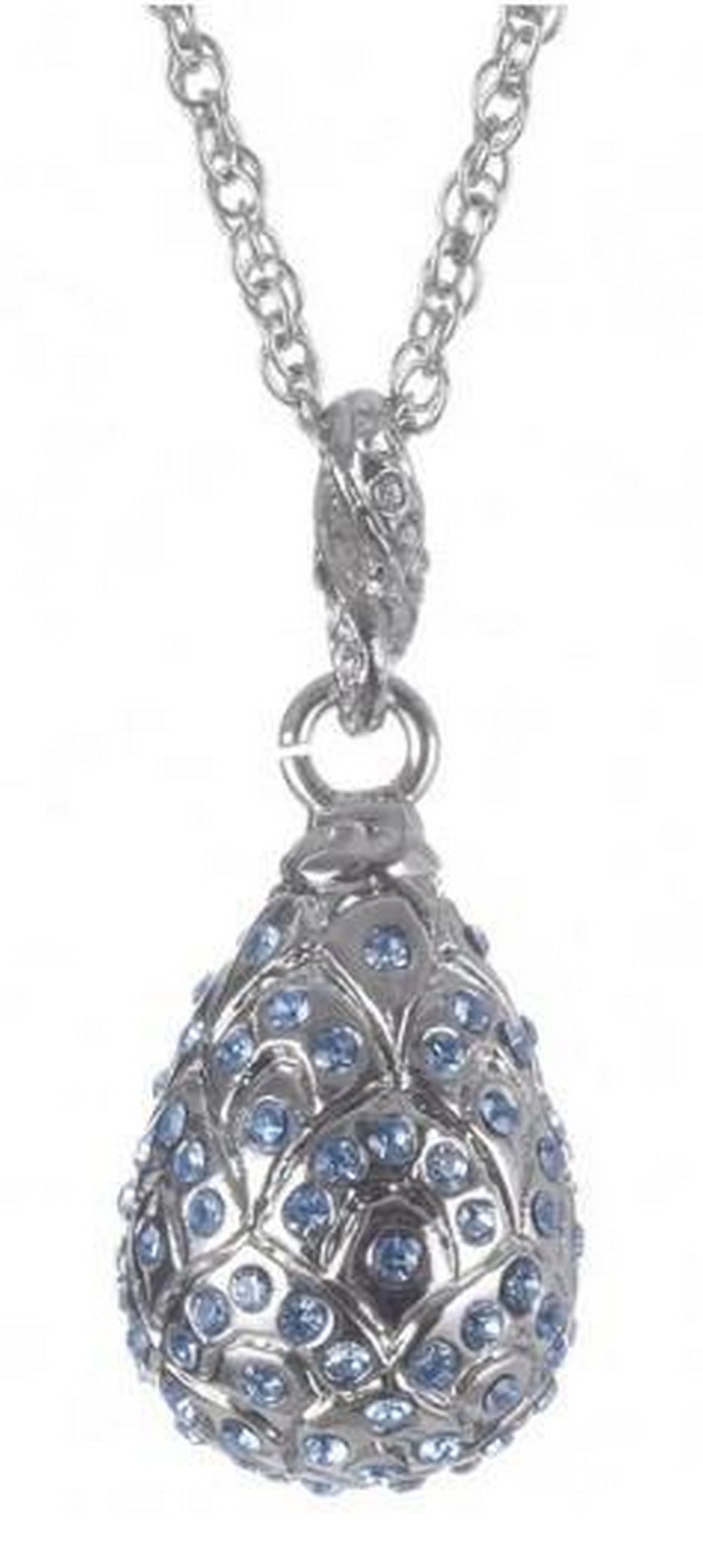 Frosted Blue Crystal Egg Pendant Necklace: Frosted Blue Crystal Egg Pendant Necklace Delicately crafted, this silver egg pendant necklace is adorned with shimmering light blue Austrian crystals that catch the light with every movement. The
