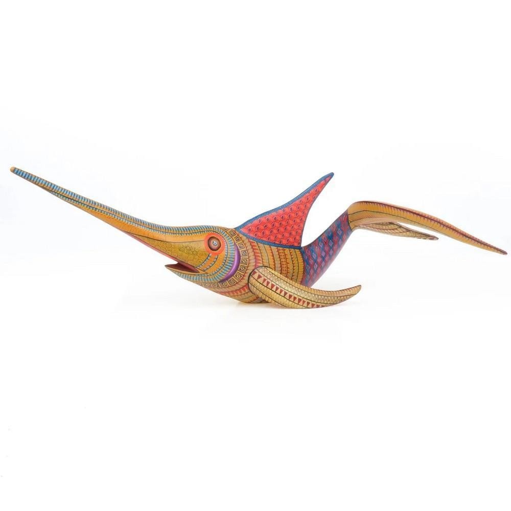 Swordfish - Oaxacan Alebrije Wood Carving: Swordfish - Oaxacan Alebrije Wood Carving An extraordinary work of art, this majestic swordfish alebrije was meticulously hand-carved from a single piece of copal wood in Oaxaca, Mexico. Taking five m