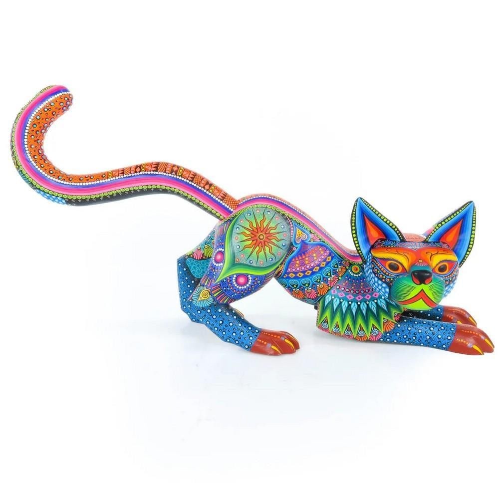 Alert Crouching Cat - Handcrafted Oaxacan Alebrije by the Sosa Family: Alert Crouching Cat - Handcrafted Oaxacan Alebrije by the Sosa Family Capture the essence of grace and vigilance with this Alert Crouching Cat alebrije, handcrafted by the renowned Sosa family in Oaxa