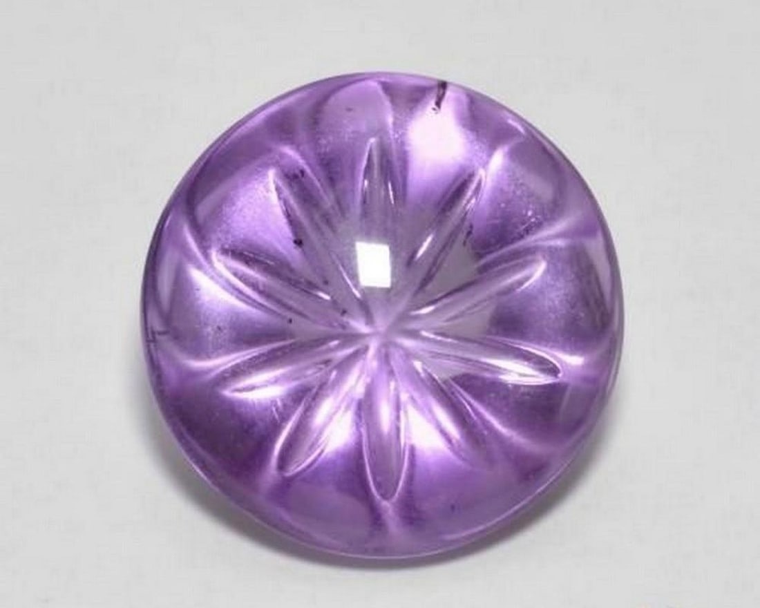 5.96 ct Round Natural Iris Violet Amethyst: 5.96 ct Round Natural Iris Violet Amethyst Introducing the Round Natural Iris Violet Amethyst, a luminous gem displaying rich violet tones with full transparency. This untreated amethyst from Brazil