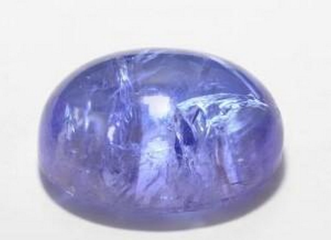 3.51ct Natural Intense Violet-Blue Tanzanite: 3.51ct Natural Intense Violet-Blue Tanzanite A dazzling 3.51-ct natural tanzanite, masterfully cut in a classic oval shape and prized for its intense violet-blue hue. This transparent gemstone radiate