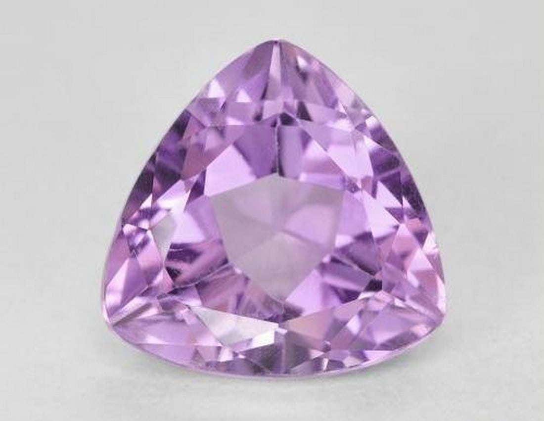 3.23ct Trillion Cut Pinkish Violet Amethyst: 3.23ct Trillion Cut Pinkish Violet Amethyst Specifications: Type: Amethyst Weight: 3.23 ct 1 gem Size: 10 X 10 mm calibrated Shape: Trillion Facet Color: Pinkish Violet Clarity: VVS-VS Treatment:
