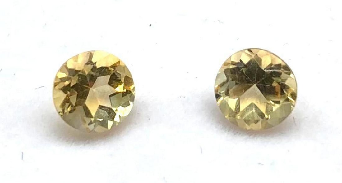 2.5ct Round Cut Champagne Citrine Gemstone Pair: 2.5ct Round Cut Champagne Citrine Gemstone Pair Dimensions: 7 x7mm Total Carat Weight: 2.50ct Treatment: Heated Origin: Brazil Please View Photos for Further Details.