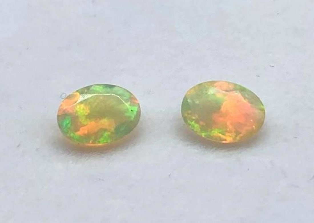 0.85ct Oval Cut Opal Gemstone Pair: 0.85ct Oval Cut Opal Gemstone Pair Size: 7mm x 5mm Total Carat Weight: 0.85ct Untreated Origin: Ethiopia Lot Contains 2 Gemstones View Photos For Further Details