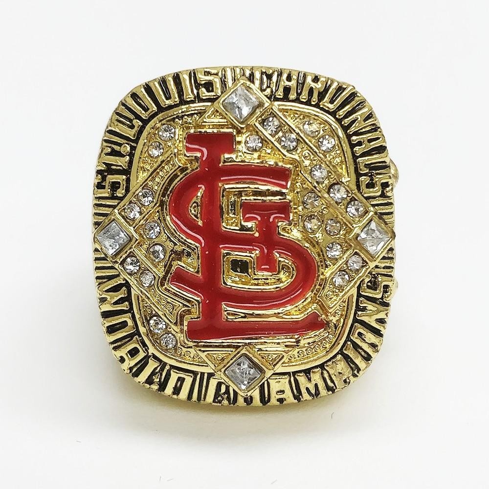 2006 St. Louis Cardinals - MLB Inspired Championship Ring: 2006 St. Louis Cardinals - MLB Inspired Championship Ring. In Enameled Red Stand Out Clearly On The Front This Gold Gilt Ring. A Great Addition For Any MLB Collection Or St. Louis Cardinals Fan The St