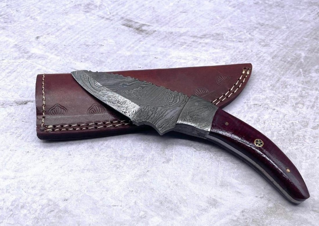 9'' Damascus Drop Point Blade With Custom Designed Exotic Handle: 9" Damascus Drop Point Blade With Custom Designed Exotic Handle Damascus Steel Blade with 256 Layers on it. HARDNESS 56-60 H R C VERY HIGH QUALITY GENUINE LEATHER SHEATH View Photos For Further