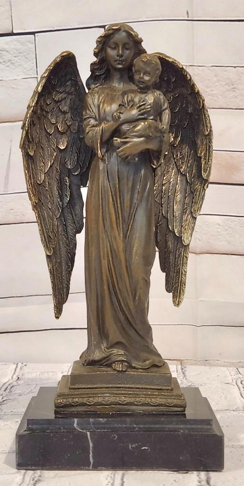 A. Moreau Inspired Guardian Angel with Baby Bronze Sculpture - 11.5'' x 5'': A. Moreau Inspired Guardian Angel with Baby Bronze Sculpture - 11.5" x 5" This bronze sculpture depicts a guardian angel gently holding a baby, reflecting themes of protection and care. The co
