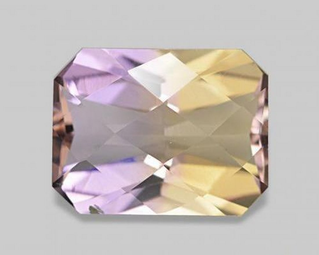 2.14 ct Octagon / Emerald Cut Natural Bi-Color Ametrine Gemstone: 2.14 ct Octagon / Emerald Cut Natural Bi-Color Ametrine Gemstone Presenting the 2.14 ct Octagon / Emerald Cut Natural Bi-Color Ametrine, a captivating gemstone displaying the striking combination of a