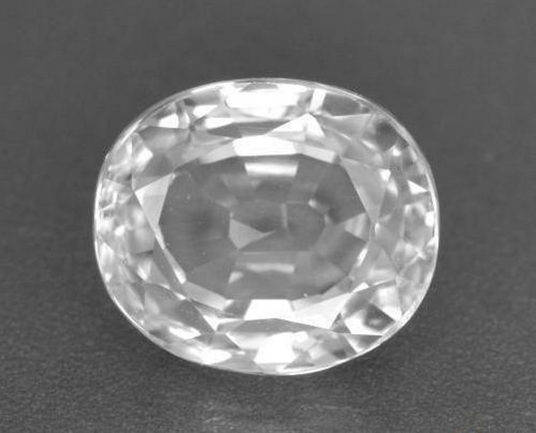 3.01 ct Natural White Zircon, Oval Cut, VVS, Cambodia: 3.01 ct Natural White Zircon, Oval Cut, VVS, Cambodia Natural zircon gemstone weighing 3.01 ct, cut in an oval facet shape with a white color. The gem measures 8.05 x 6.90 x 4.54 mm (calibrated 8.1 x 