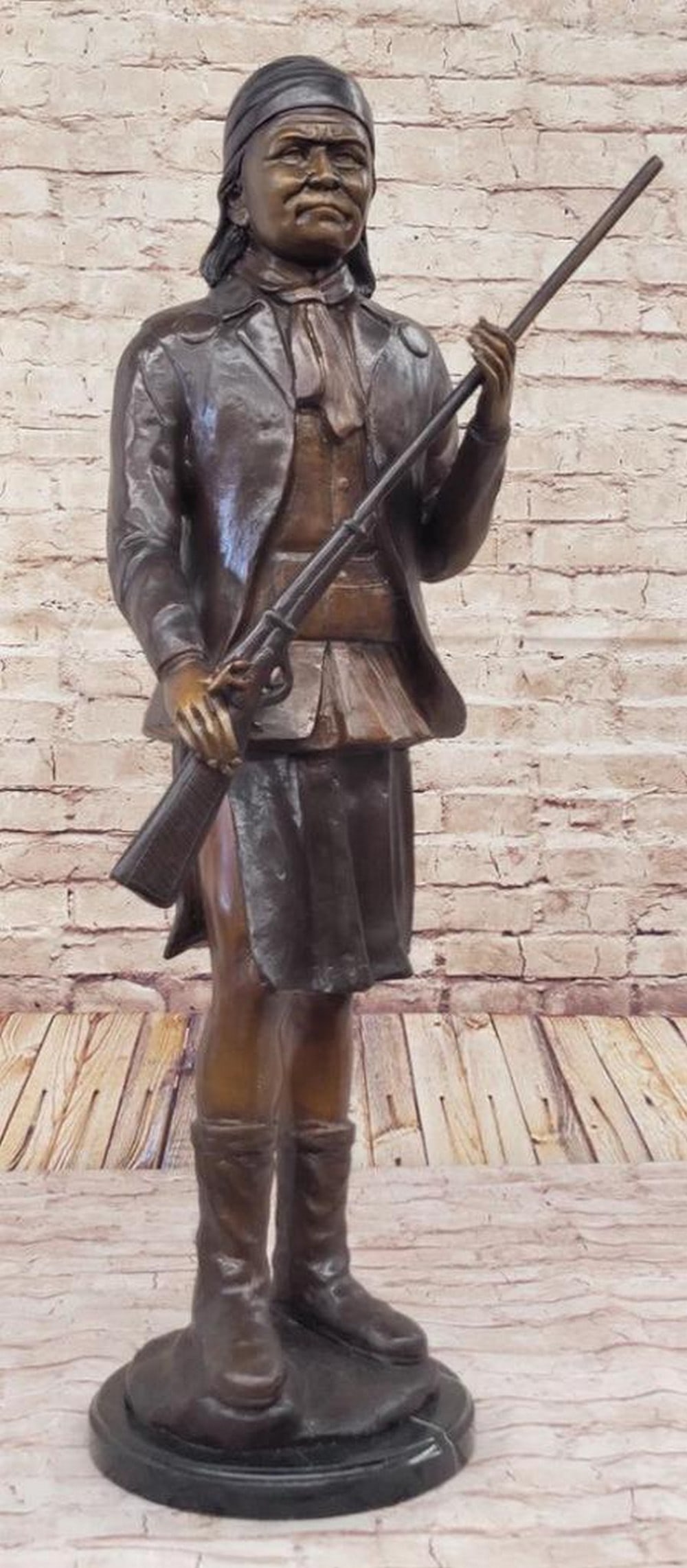 Geronimo With Rifle: A Captivating Inspired Bronze Sculpture by C.M. Russell - 31'' x 19.5'': Geronimo With Rifle: A Captivating Inspired Bronze Sculpture by C.M. Russell - 31" x 19.5" Immerse yourself in the profound legacy of Native American history with "Geronimo With Rifle,"